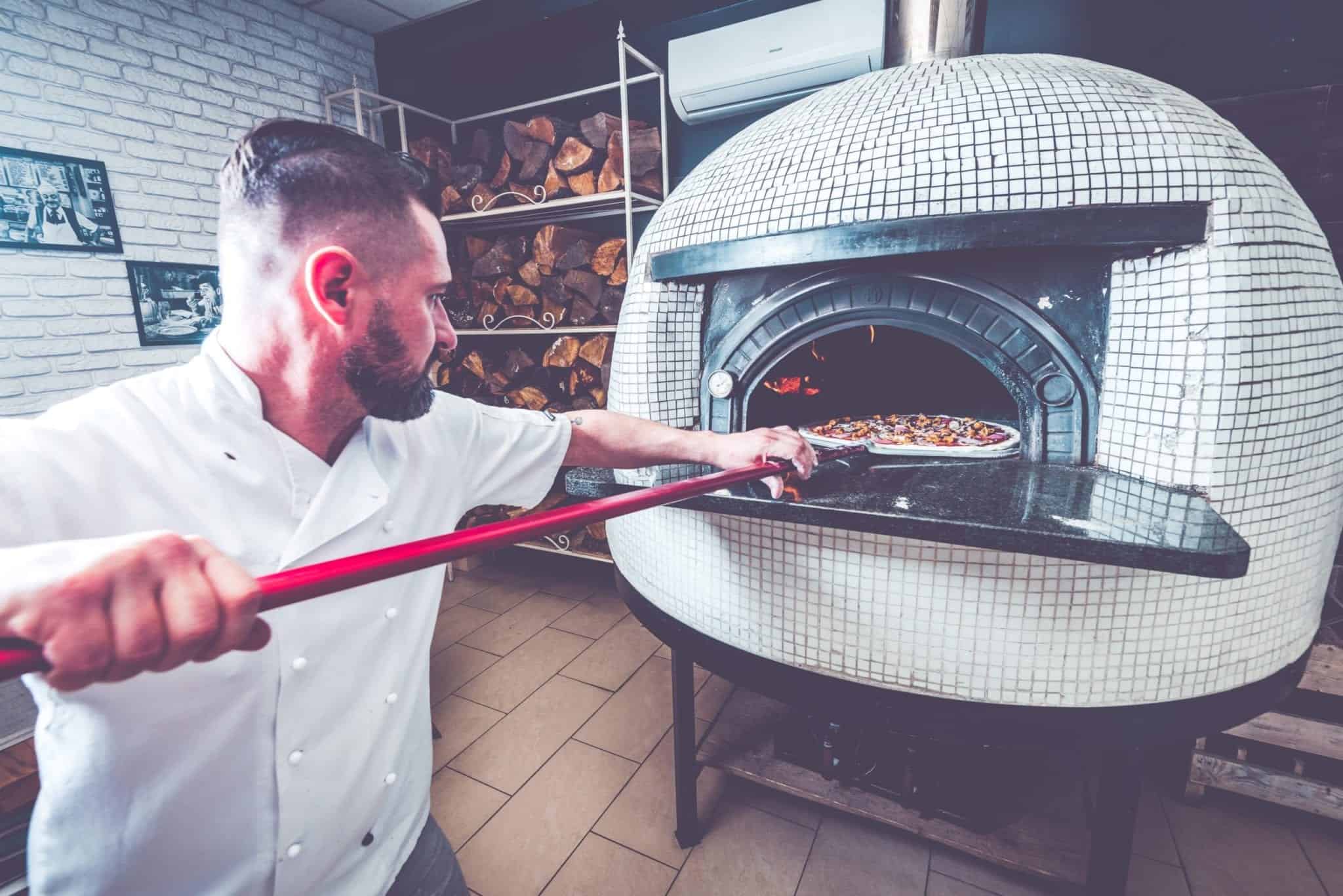 bearded-man-chef-preparing-pizza-at-local-PZV8SMF - Pointe Pest Control ...